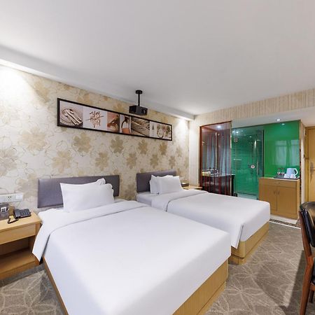 Fuhao Hotel Canton Extérieur photo